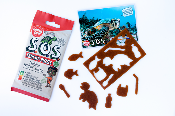 Sie sehen eine Packung S.O.S. Frucht-Puzzle Pfirsich - Display 20 Stk., Produktbild: 02 S.O.S. Frucht-Puzzle Pfirsich - Display 20 Stk., A-Nr.: 5684115 - 02